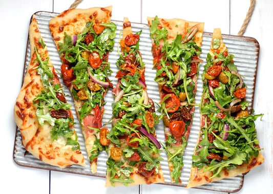 Long slices of pizza - The Woodfired Co