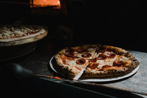 Whole pizza from oven - The Woodfired Co